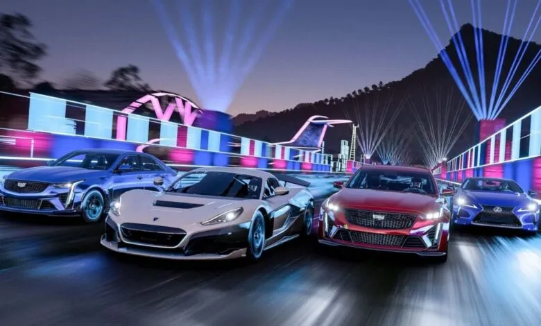 Four high-performance cars racing on a neon-lit track at night.