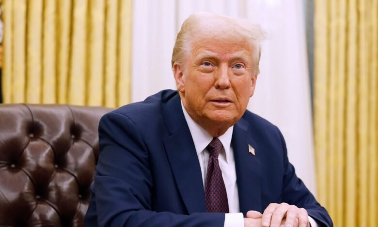 Donald Trump in the Oval Office, seated in a leather chair.