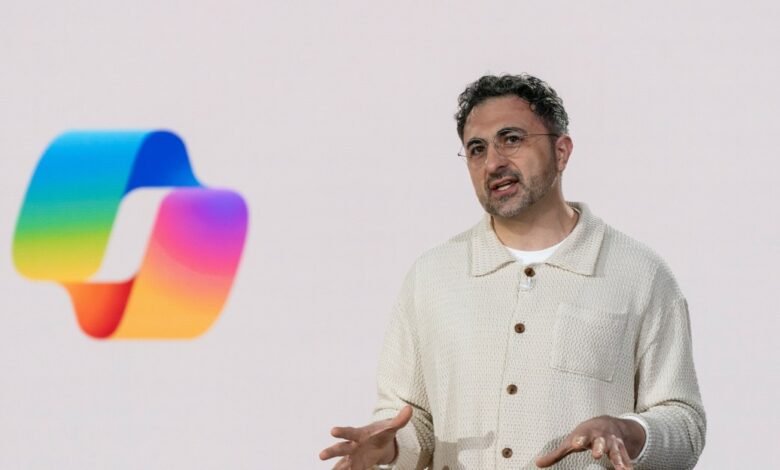 Chris Cox, Meta's Chief Product Officer, speaks at a presentation with the new Meta logo visible.