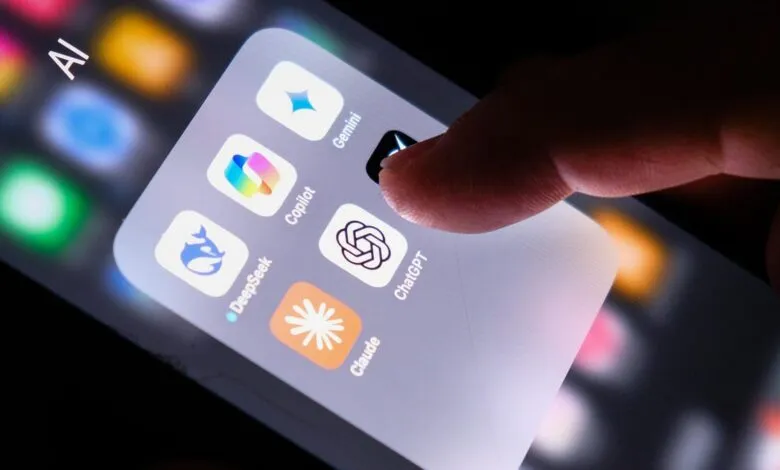 A finger taps on the ChatGPT app icon on a smartphone screen displaying AI applications.