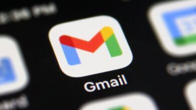 Close-up of the Gmail app icon on a smartphone screen. The icon is a multicolored 'M' with the word 'Gmail' below it.