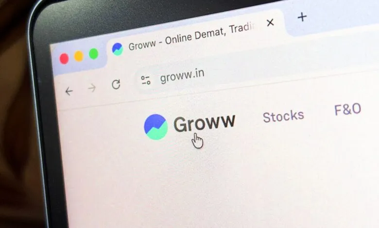 Groww website homepage displayed on a laptop screen, showing the logo and options for stocks and F&O trading.
