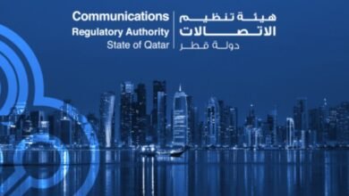 Communications Regulatory Authority of Qatar logo with Doha skyline at night.