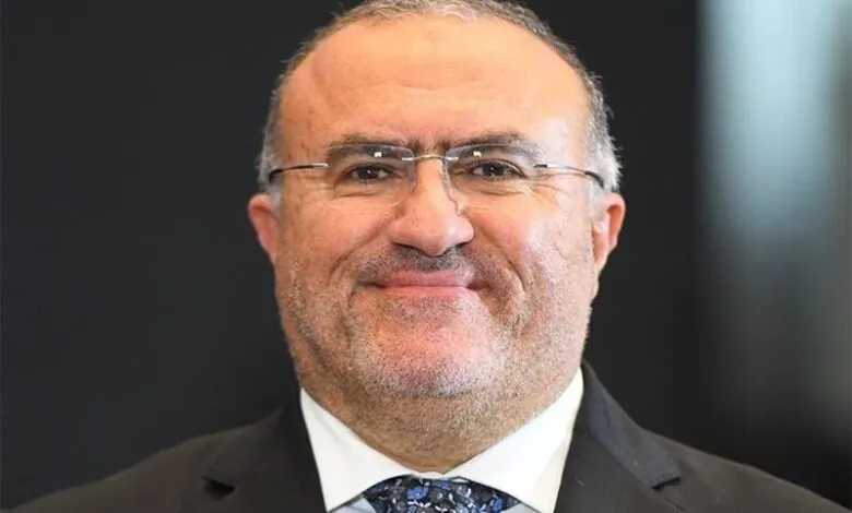 Headshot of Fernando Medina, Portuguese Minister of Finance, wearing glasses and a suit.