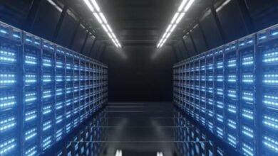 Rows of illuminated server racks in a modern data center.