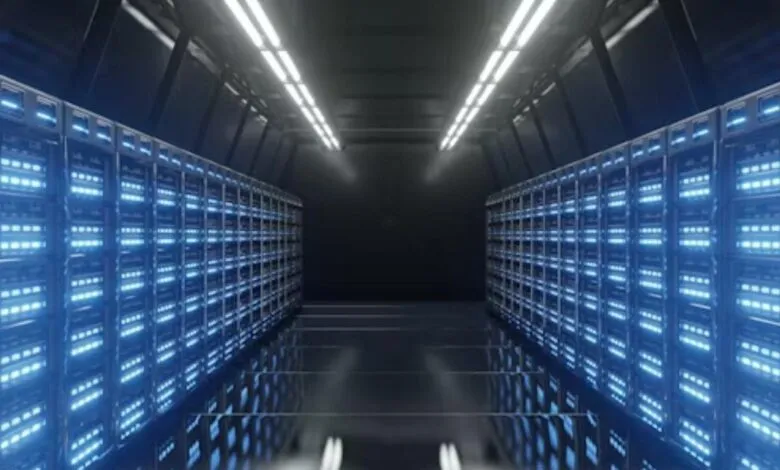 Rows of illuminated server racks in a modern data center.