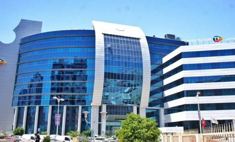 Tunisie Telecom headquarters building, modern architecture, blue glass facade.
