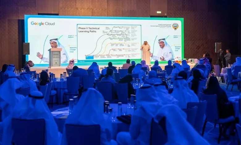 Speaker presenting Google Cloud technical learning paths to an audience in Kuwait.