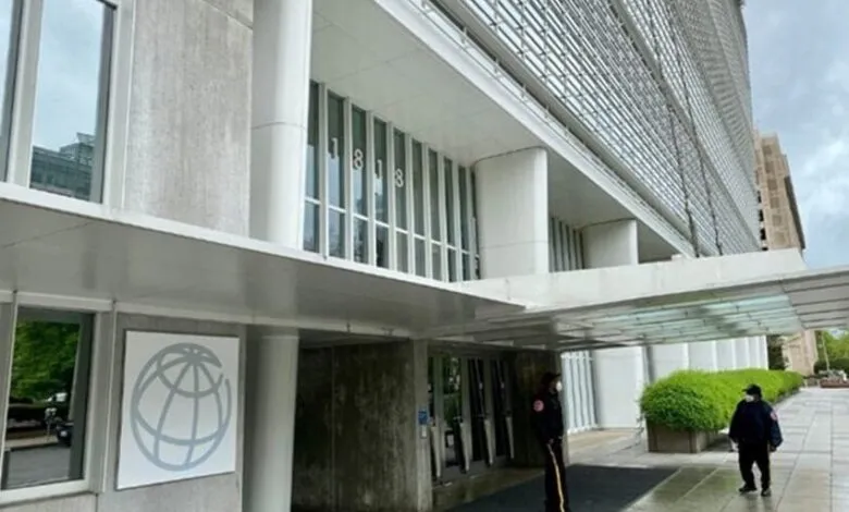 Entrance to the International Monetary Fund building with security guards present.