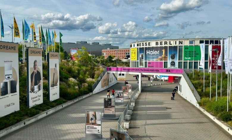 IFA Berlin 2025 entrance with large banners and signage from various brands like Haier and Dreame.