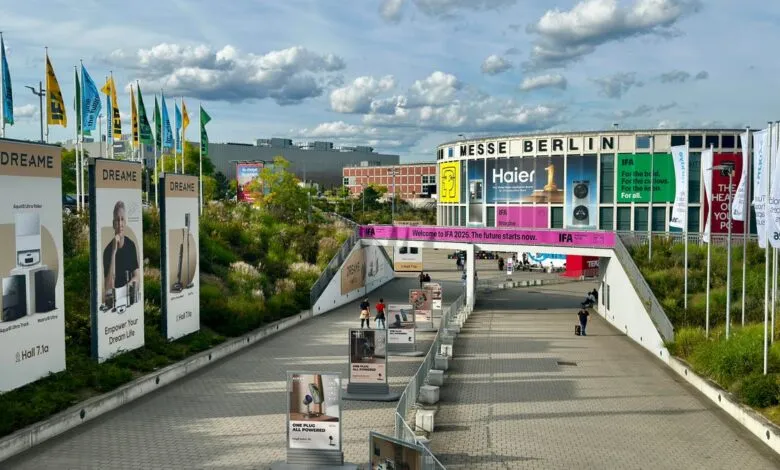IFA Berlin 2025 entrance with large banners and signage from various brands like Haier and Dreame.