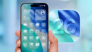 iPhone displaying iOS 26 interface with weather, calendar, and app icons. Number 26 is prominently featured.