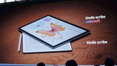 Amazon Kindle Scribe with stylus displaying a colorful butterfly and flower drawing.