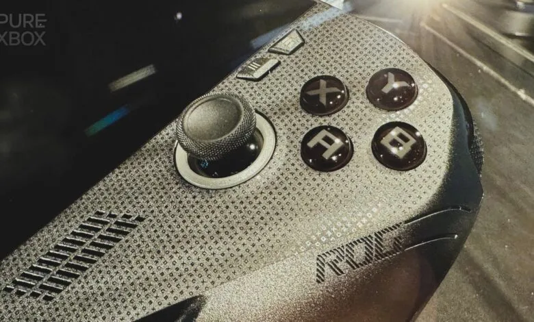 Close-up of a textured Xbox controller with diamond pattern and buttons.