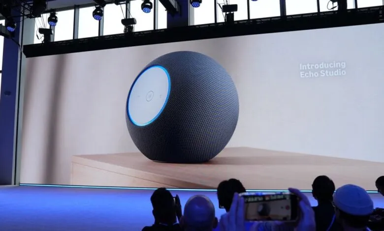 Amazon Echo Studio smart speaker displayed on a stage during a product introduction.