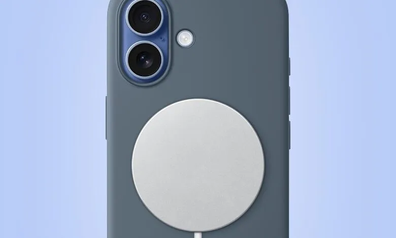 iPhone in a dark gray case with a MagSafe charger attached.