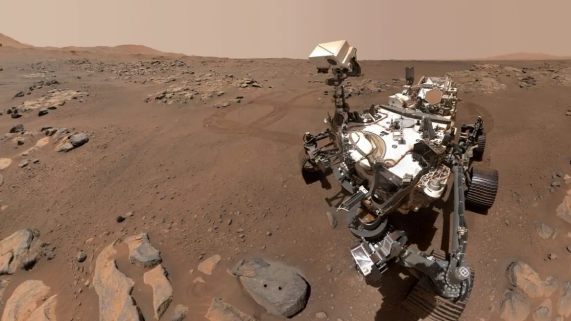 Mars rover on the red planet's surface, exploring rocky terrain.