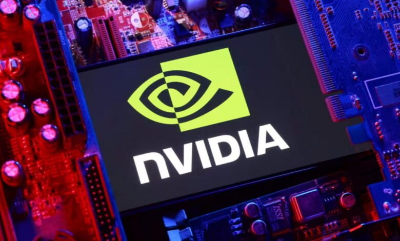 NVIDIA logo displayed on a computer circuit board, illuminated in vibrant red and blue.