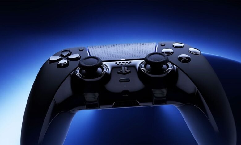 Close-up of a sleek, black PS5 DualSense Edge controller against a dark blue background.