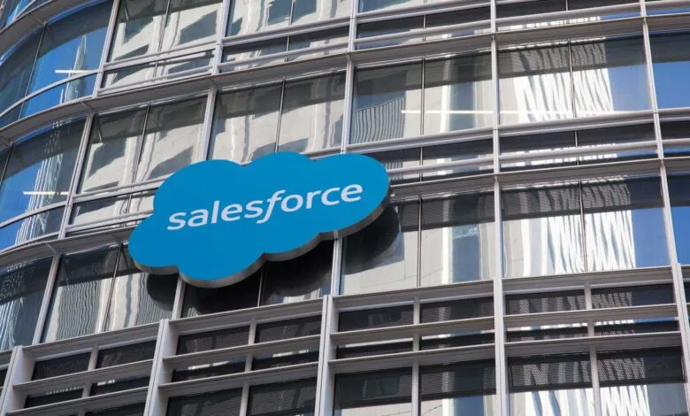 Salesforce logo on a modern glass building.