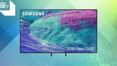 Samsung 2025 Neo QLED TV displaying a vibrant abstract landscape with purple and teal hues.