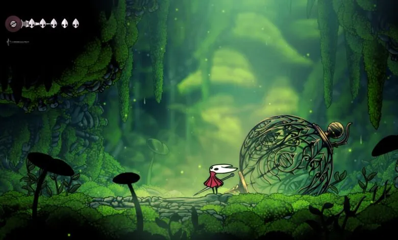 Knight from Hollow Knight video game exploring a lush, green forest area with a large ornate orb.