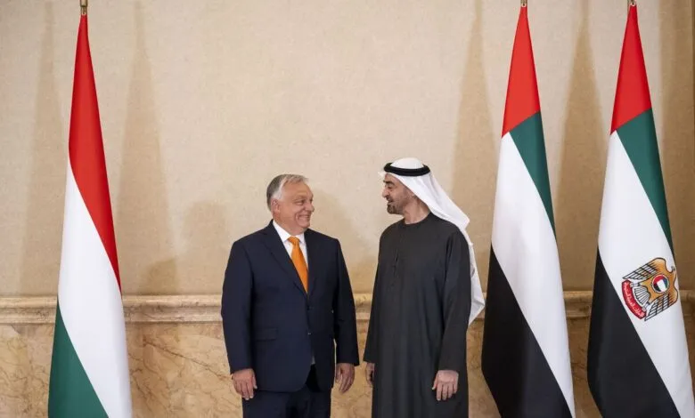 Viktor Orbán, Prime Minister of Hungary, and Mohammed bin Zayed Al Nahyan, President of the UAE, stand smiling, flanked by Hungarian and UAE flags.