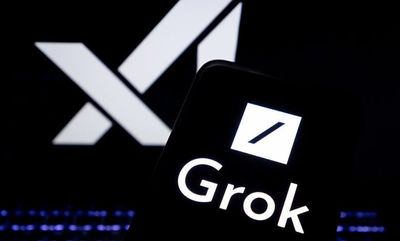 Grok logo on a smartphone with a blurred X logo in the background.