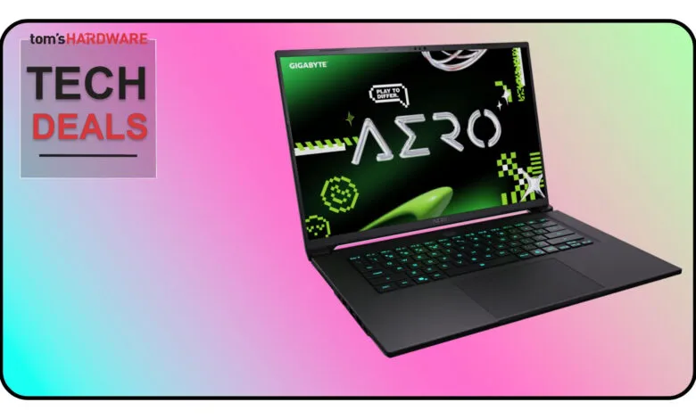 Gigabyte Aero laptop with vibrant green and pink accents, showcased against a gradient background.