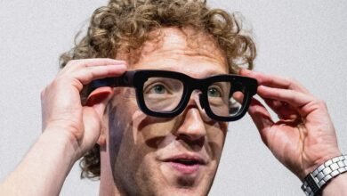 Mark Zuckerberg, Meta CEO, adjusts a pair of prototype smart glasses.