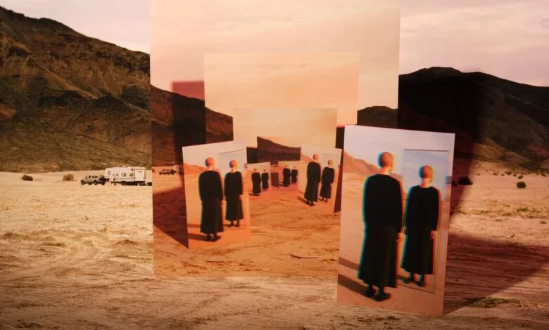 Figures in black robes stand in a desert landscape, reflected in multiple mirrors.