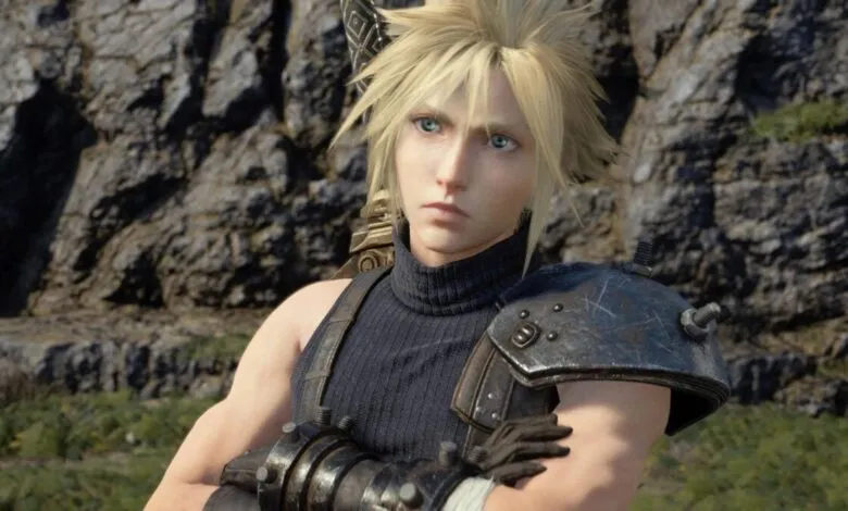 Close-up of Cloud Strife from Final Fantasy VII Remake with blonde spiky hair and blue eyes.
