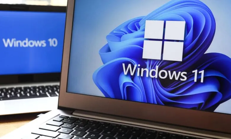 Two laptops side-by-side, one displaying Windows 11 and the other Windows 10.