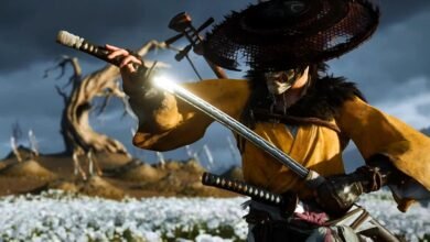 Samurai warrior in yellow robes and mask draws a glowing katana in a field of white flowers.