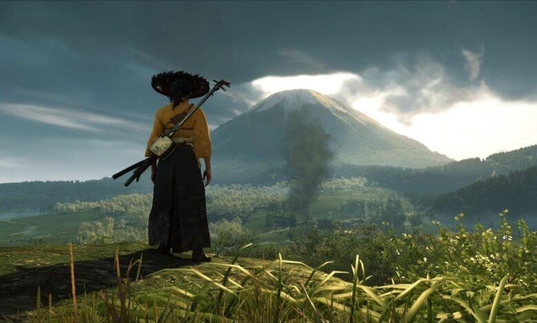 Samurai warrior with a shamisen and swords looks out over a misty valley towards a snow-capped mountain.