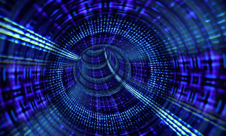 Abstract digital tunnel with glowing blue and purple lights, representing data flow.