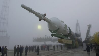 Soyuz rocket being transported to the launch pad on a foggy day at Baikonur Cosmodrome.
