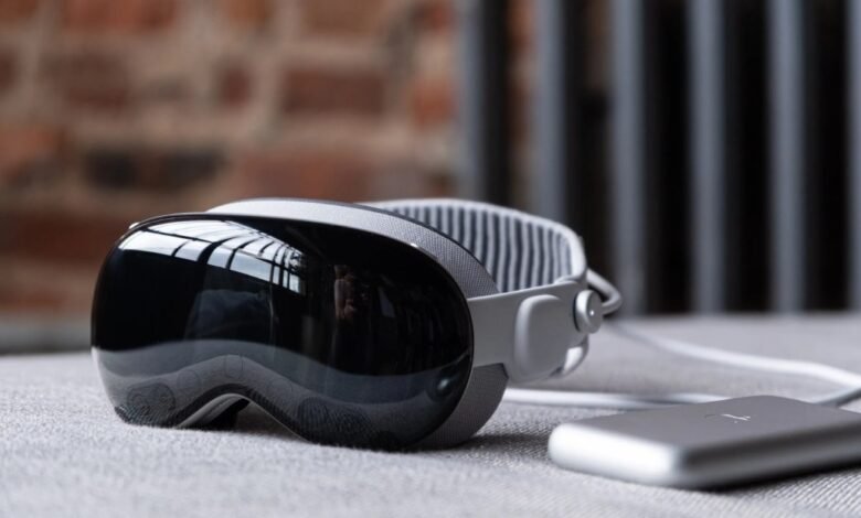 A sleek, white and gray virtual reality headset with a reflective black visor.