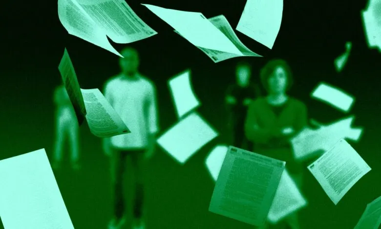 Blurred figures stand as documents float around them in a green-tinted image.