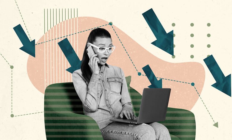 Woman on phone looking shocked with laptop, surrounded by downward trending arrows.