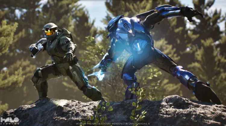 Master Chief in green armor fights a blue Spartan with energy swords in a forest.