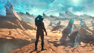 Astronaut in a futuristic suit stands on a rocky alien planet, looking at glowing blue crystals.