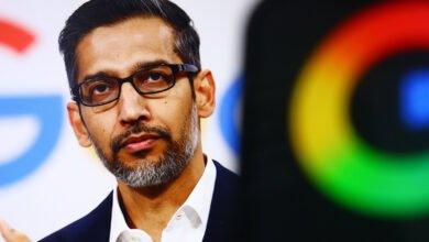 Sundar Pichai, CEO of Alphabet and Google, wearing glasses and a suit.