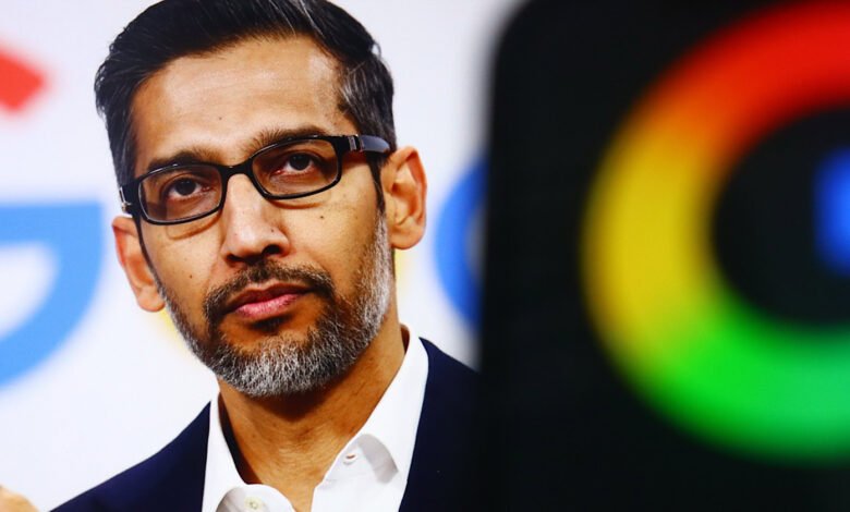 Sundar Pichai, CEO of Alphabet and Google, wearing glasses and a suit.