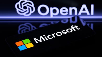 Microsoft and OpenAI logos displayed on a smartphone screen.