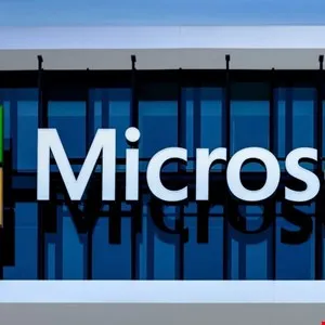 Close-up of the Microsoft logo on the exterior of a modern building.