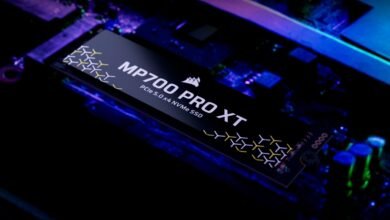 Corsair MP700 PRO XT NVMe SSD on a motherboard with blue and purple lighting.