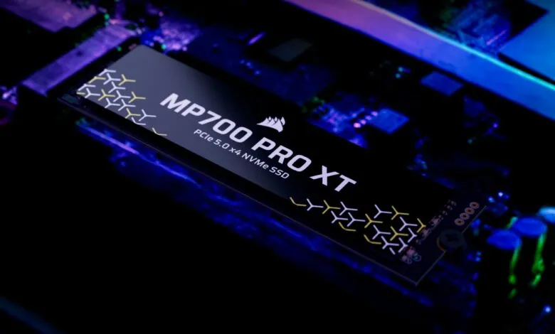 Corsair MP700 PRO XT NVMe SSD on a motherboard with blue and purple lighting.