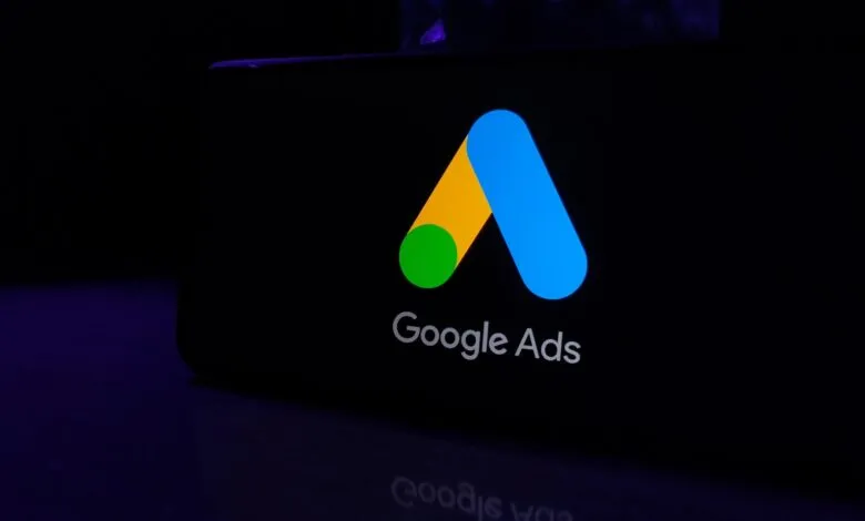 The Google Ads logo displayed on a dark screen with purple lighting.