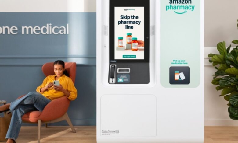 Woman using phone next to Amazon Pharmacy kiosk in a One Medical office.